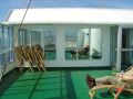 Click for Fullsize. (800 x 600) The Commodore Class Sundeck on Deck 9. Note the mirrored windows to the Commodore Lounge! :) Photo: Paul Byrne