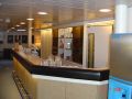 Click for Fullsize. (800 x 600) The Commodore Reception desk on Deck 9. Photo: Paul Byrne
