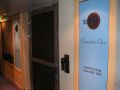 Click for Fullsize. (800 x 600) The entrance to the Commodore Class area on Deck 9. Photo: Ilja Berunenko
