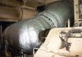 Click for Fullsize. (708 x 490) The huge port exhaust pipe inside the engine room. (1996) Photo: Martin Rogge